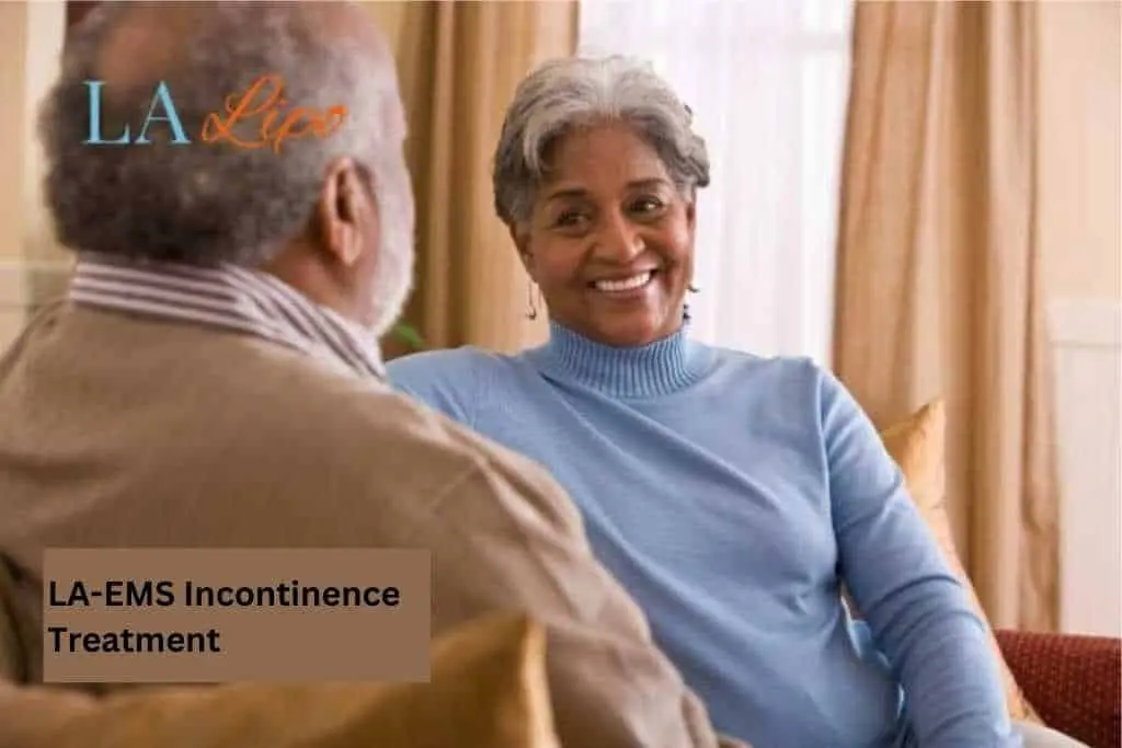 Couple sat smiling at each other - LA-EMS treatment Tolworth